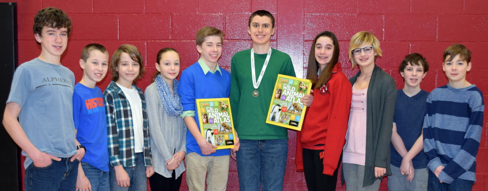 Wells Junior High contestants in the recent geography bee at the school include, from left, Wyatt Rowe, Covy Dufort, Garner Holdsworth, Katie Plourde, first runner-up Spencer Poulin, champion Matt Chase, Tori Hayward, Hannah Chase, Samuel Norbert and Guss Madsen.