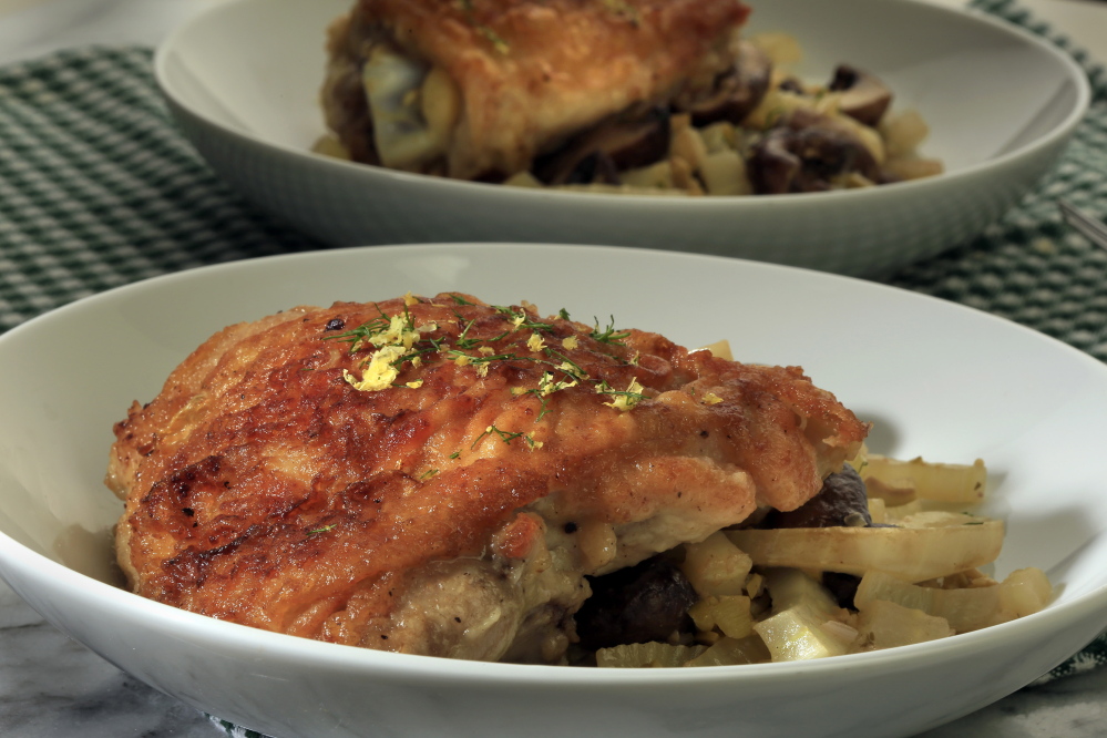 Chicken braised with fennel, mushrooms and olives.