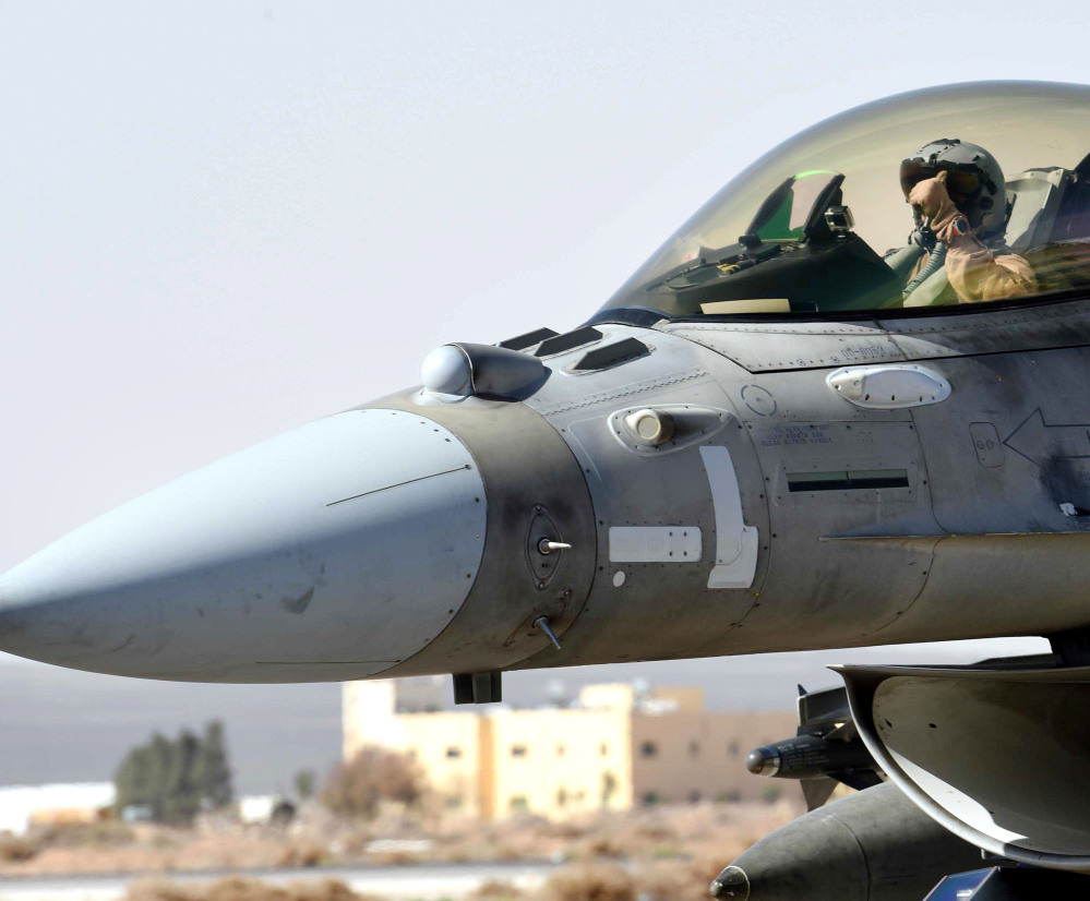 A United Arab Emirates pilot gets ready to launch an airstrike from Jordan on Tuesday.