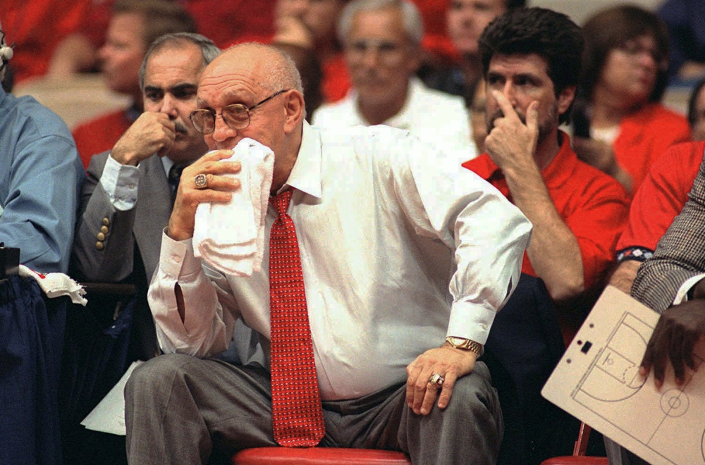 Jerry Tarkanian watches his Fresno State team play in 1995. Tarkanian, who built a basketball dynasty at UNLV but was defined more by his decades-long battle with the NCAA, died Wednesday in Las Vegas after several years of poor health.