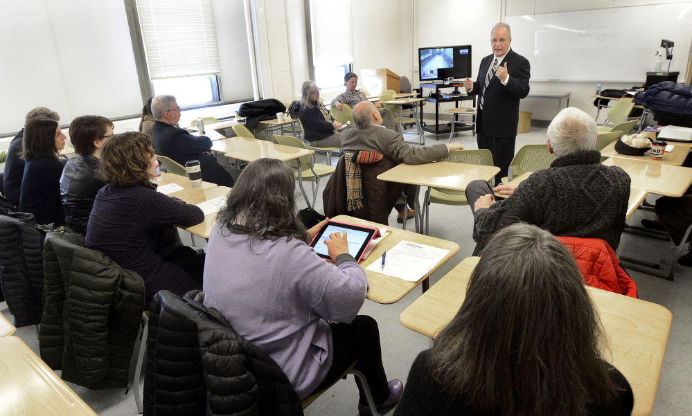 Harvey Kesselman, a finalist for the University of Southern Maine president’s job, speaks to faculty members at Luther Bonney Hall in Portland on Thursday.