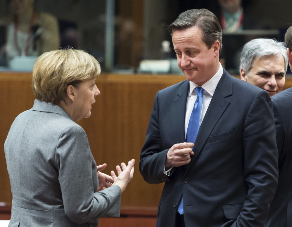 German Chancellor Angela Merkel discusses peace prospects with British Prime Minister David Cameron.