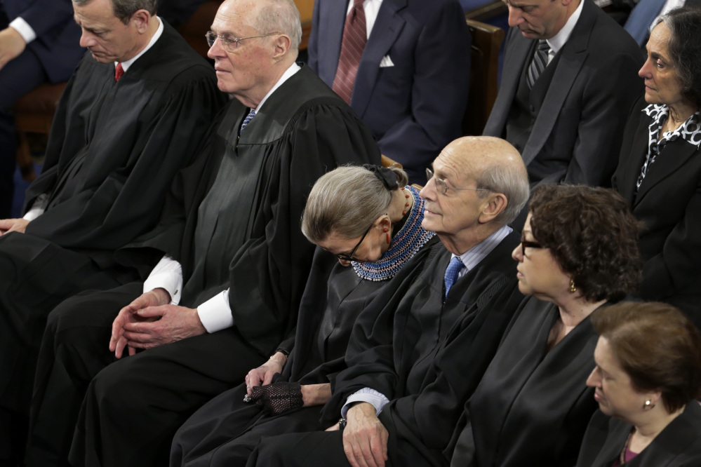 Supreme Court Justice Ruth Bader Ginsburg, center, dozes during President Obama’s State of the Union address on Jan. 20. Ginsburg told an audience Thursday that she “wasn’t 100 percent sober” at the speech, after drinking wine at dinner beforehand.