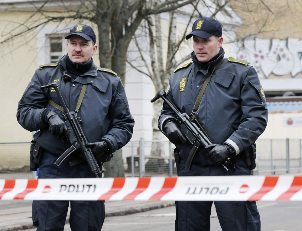 Danish police officers secure near to where a man was shot dead on Sunday in Copenhagen, Denmark. Danish police shot and killed a man early Sunday suspected of carrying out shooting attacks at a free speech event and then at a Copenhagen synagogue, killing two men, including a member of Denmark’s Jewish community. Five police officers were also wounded in the attacks.