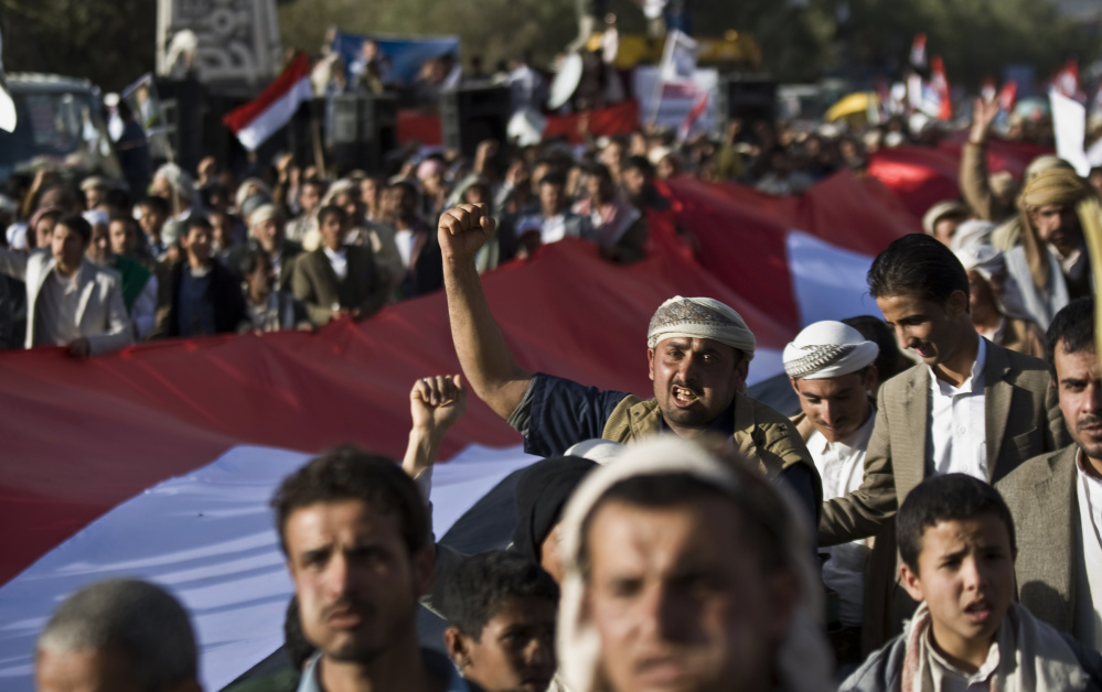 Houthi Shiite supporters celebrate the fourth anniversary of the uprising in Sanaa, Yemen. The U.N. Security Council on Sunday demanded that rebels give up control of Yemen.