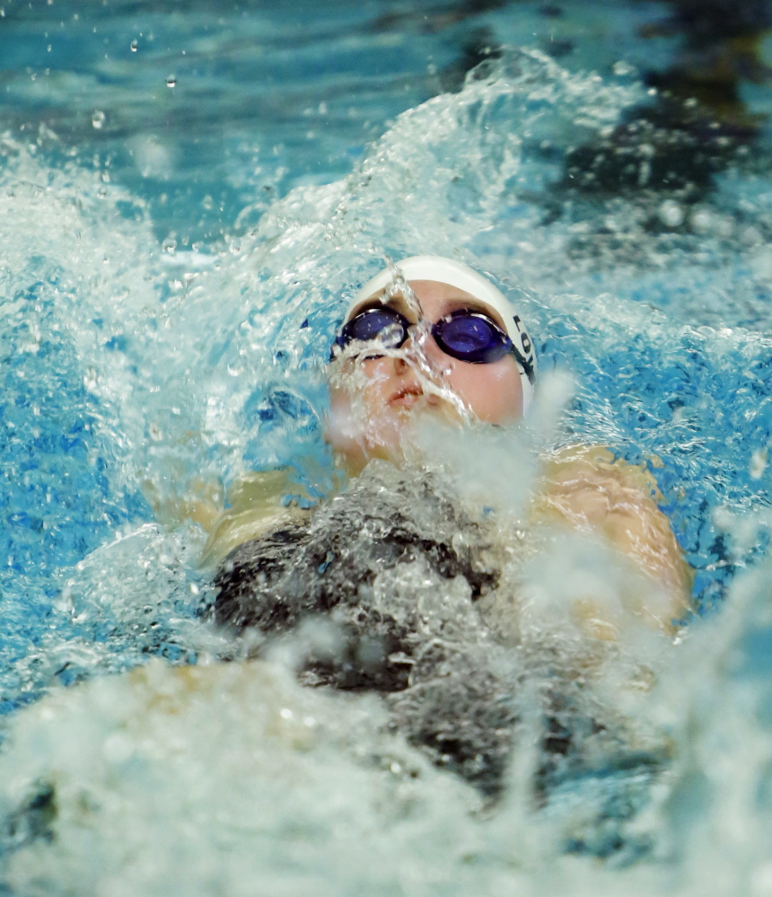 Marshall Lowery of Kennebunk swims the backstroke portion of the 200 individual medley. Lowery captured the event with a time of 2 minutes, 13.04 seconds.