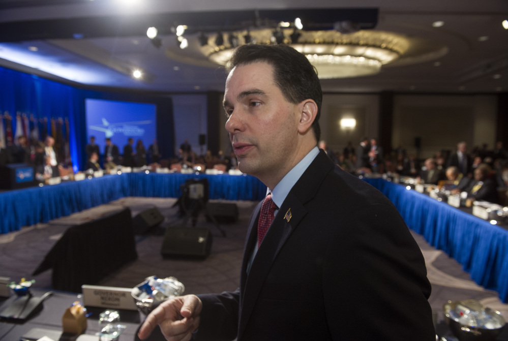 Wisconsin’s Scott Walker, a possible presidential candidate, is among some Republican governors in support of efforts to push back on the president’s immigration plan.