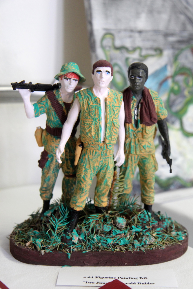 A figurine group titled “Iwo Jima,” completed by Gerald Bubier, stands on display Saturday at the 2015 Maine Veterans Creative Arts Festival.