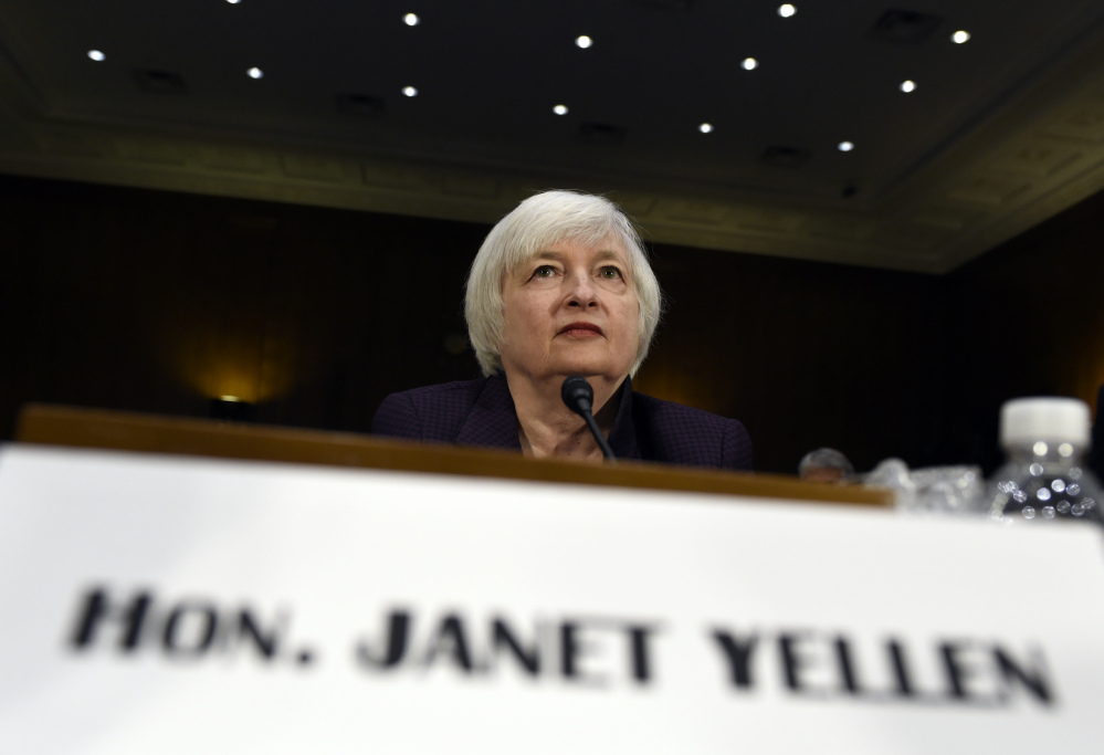 Federal Reserve Board Chair Janet Yellen prepares to testify on Capitol Hill in Washington on Tuesday before the Senate Banking Committee.