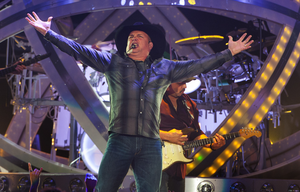 Country music star Garth Brooks kicks off his Garth Brooks World Tour at the Allstate Arena on Sept. 4, 2014, in Rosemont, Ill.