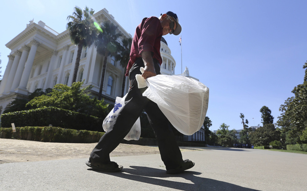 Plastic bags would be phased out of many California stores under a new state law, but a trade group has garnered enough support for referendum to block the move.