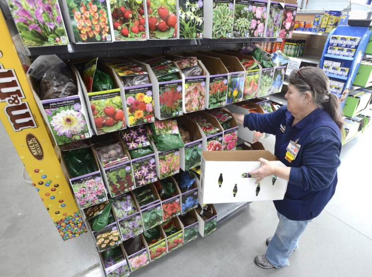 “I think this is a wonderful place to work,” said Sue Mondor, a 12-year employee who manages the lawn and garden department at Wal-Mart’s Scarborough store. As she stocked shelves Tuesday, Mondor said the company’s new pay policy will boost morale and “get people to stay longer.”
