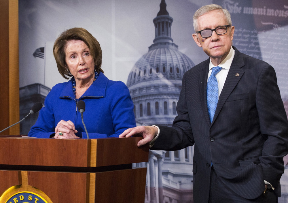 Senate Minority Leader Harry Reid, right, and House Democratic Leader Nancy Pelosi discuss funding for the Department of Homeland Security in Washington on Thursday. Reid declined to say whether he would try to block a short-term, stopgap bill if the House passed one. Pelosi argued that a short-term bill is not an ideal solution.