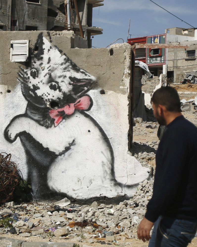 A mural of a kitten was presumably painted by street artist Banksy in the northern Gaza Strip.
