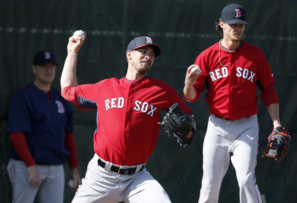 Rick Porcello, left, and Clay Buchholz will be counted on for big seasons as the Boston Red Sox attempt to prove a team can win big without the presence of an established No. 1 starter.