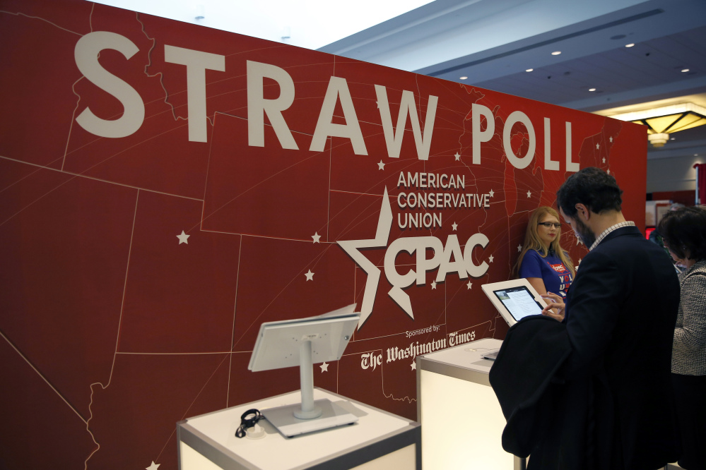 Attendees vote in the CPAC 2015 Straw Poll at the Conservative Political Action Conference on Friday.