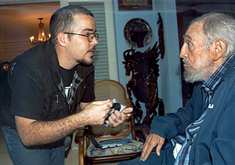 Cuba's website Cubadebate displays a photo of Fidel Castro talking with the head of the main Cuban student union Randy Perdomo Garcia in Havana Tuesday. The Associated Press