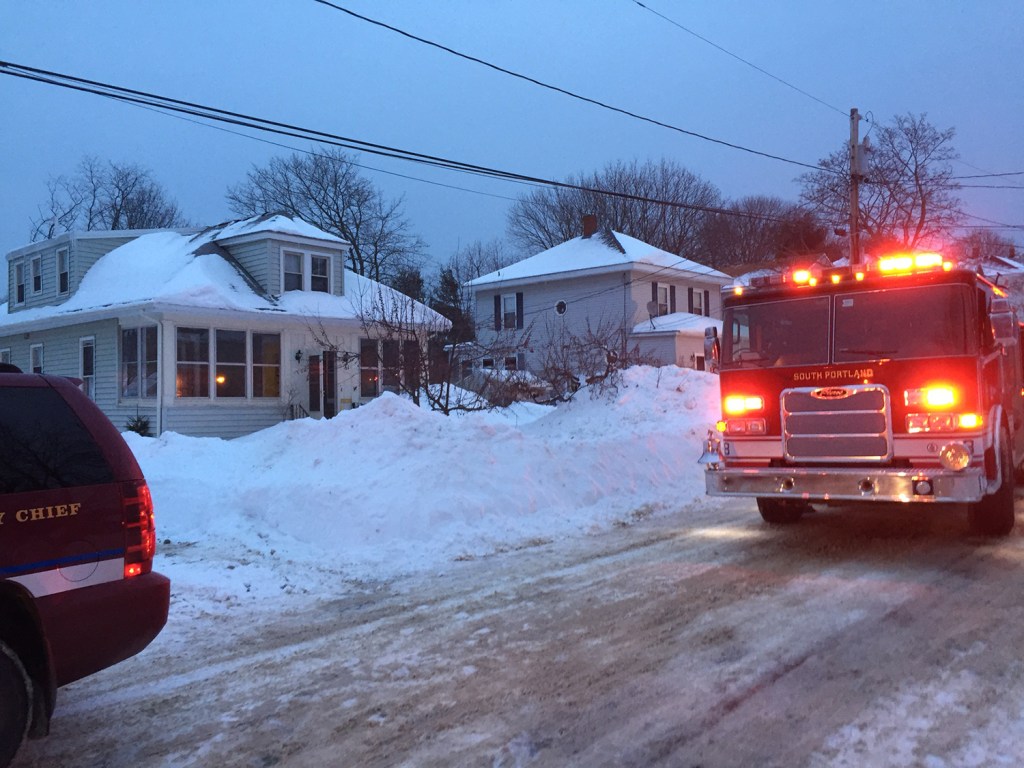 Firefighters at the scene of a fire at 61 Ocean View Ave. in South Portland. Ray Routhier/Staff Writer