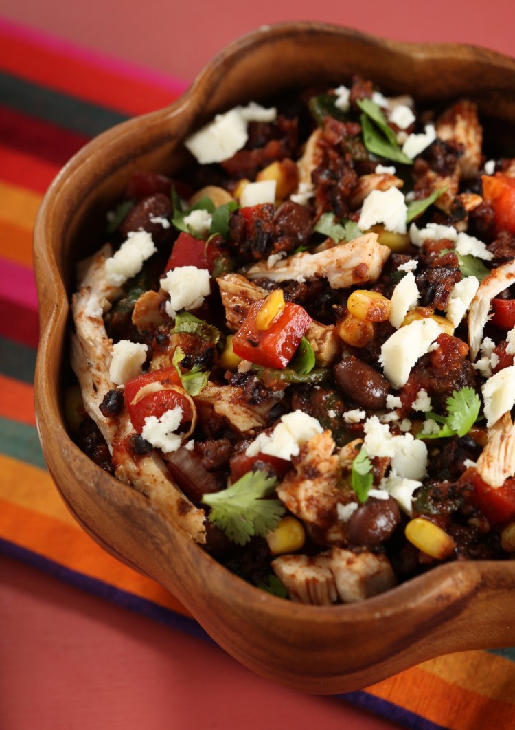 Black beans and black rice combine in a main dish that also packs in poblanos, corn, red peppers, queso fresco and more