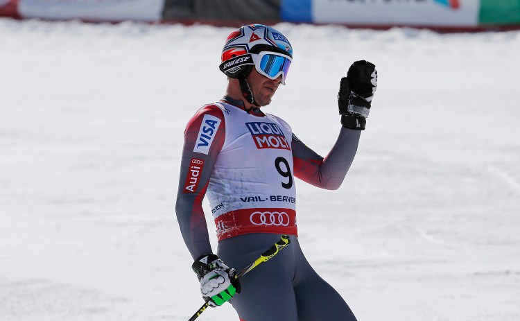 Bode Miller waves after crashing during the men's super-G competition at the alpine skiing world championships Thursday in Beaver Creek, Colo. Miller did not finish the race and went instead to a hospital to have a torn tendon repaired. 