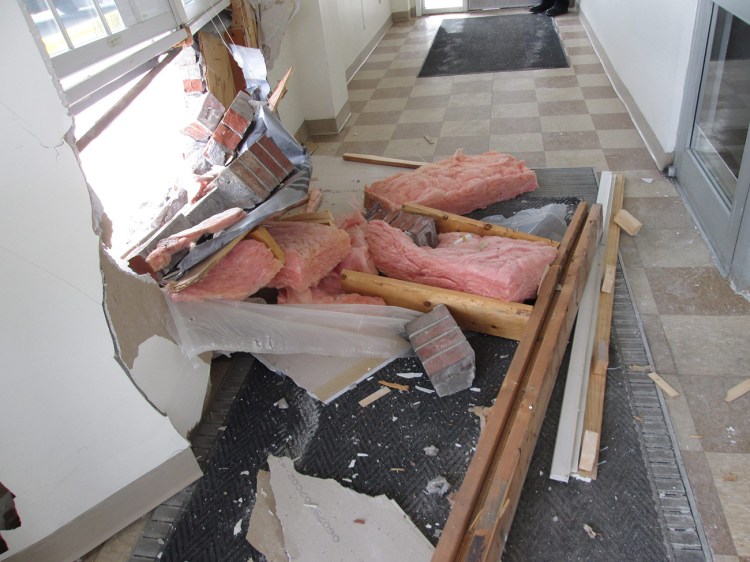 Debris litters the front lobby of the Yarmouth post office after a truck hit the building on Thursday. Courtesy Yarmouth police