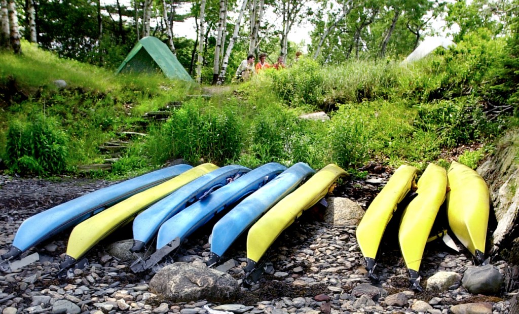 A group of kayakers parks for a couple days on Jewell Island.