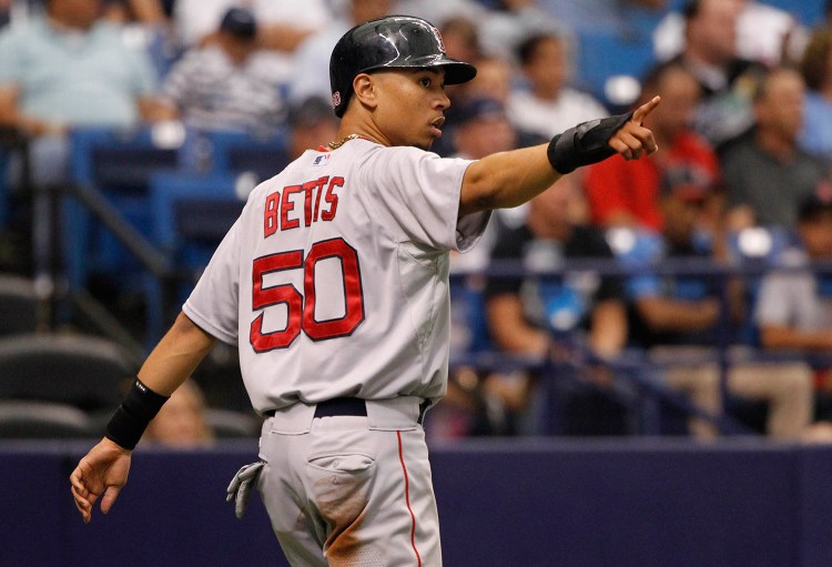 Mookie Betts has earned the spot in center. He has shown great range, and an arm that continues to improve.
The Associated Press