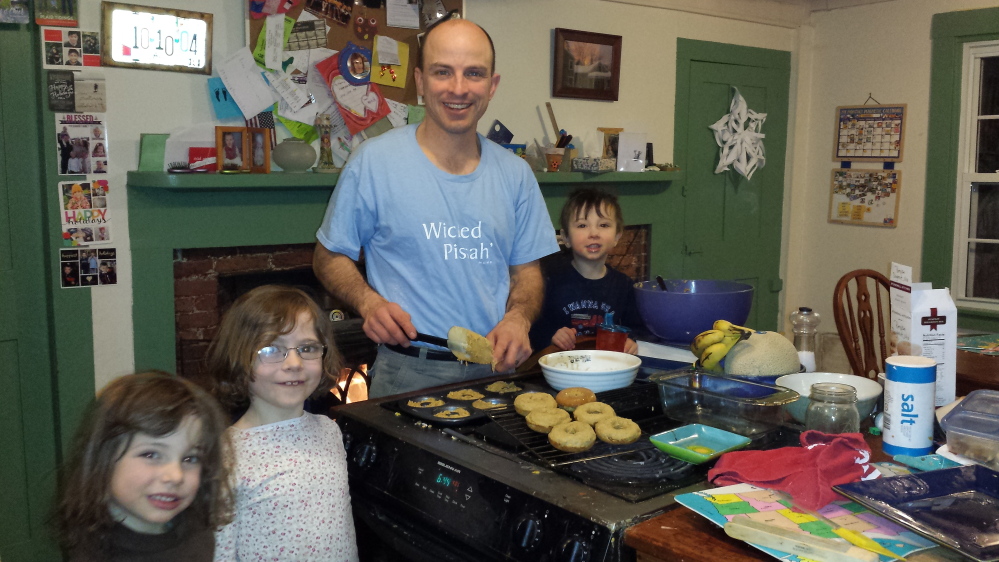 Chris Myers Asch with sous chefs Robin, 5, Miriam, 7, and Aaron, 2. The family lives in Hallowell.