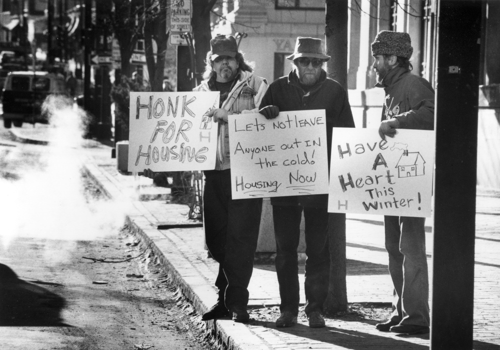 Pete LeClerc, Paul Lichter, and Jeffrey Phillips keep their weekly noontime Wednesday vigil in Portland’s Monument Square on Dec. 13, 1989. Throughout the 1980s, the state was reducing the size of its mental health institutions, which effectively put more people with mental illness onto the streets.
