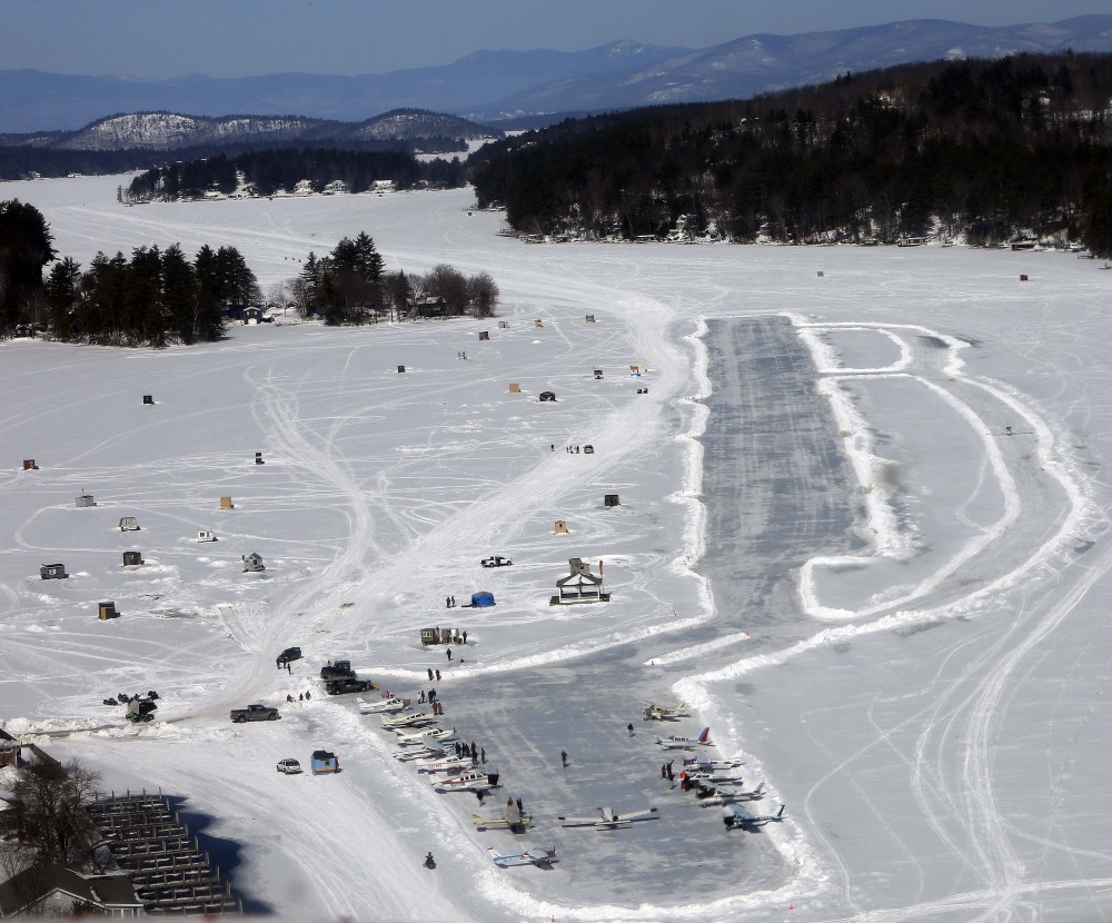 Planes sit parked on frozen Lake Winnipesaukee on Saturday. The lake is a popular winter destination for pilots.
