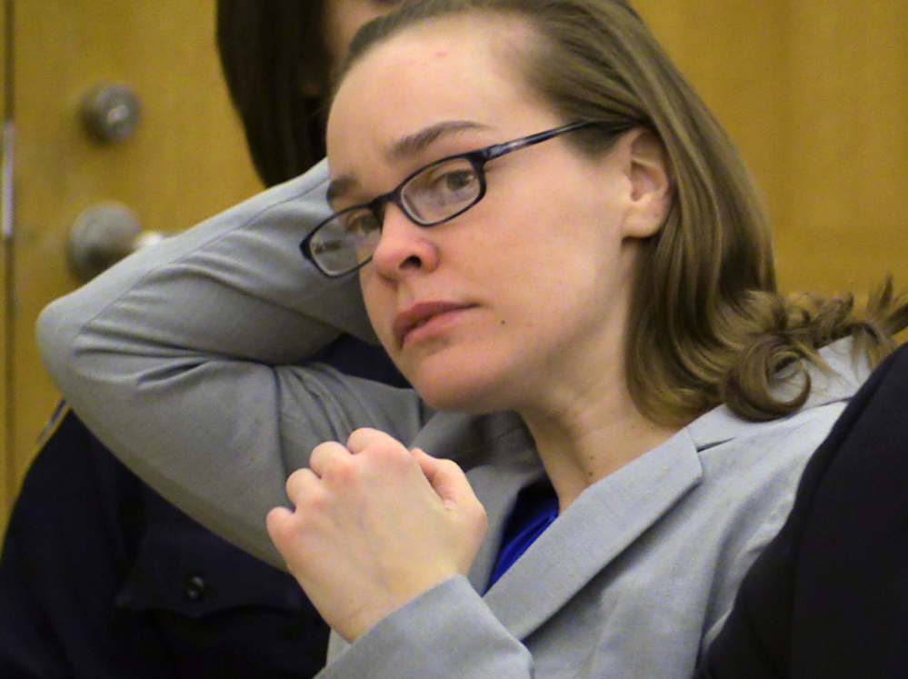 Lacey Spears brushes her hair back during her murder trial last month at the Westchester County Courthouse in White Plains, N.Y. Spears was convicted Monday of poisoning her son, 5-year-old Garnett-Paul Spears, to death.