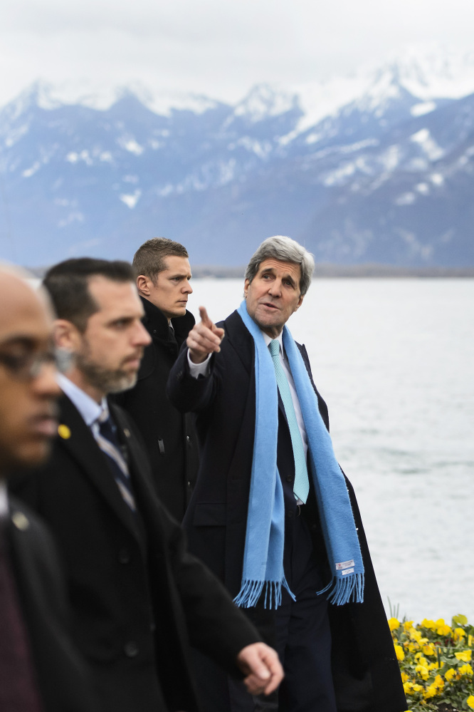 Secretary of State John Kerry walks on the bank of Lake Geneva before meeting with Iranian Foreign Minister Mohammed Javad Zarif for a new round of nuclear talks in Montreux, Switzerland, on Monday.