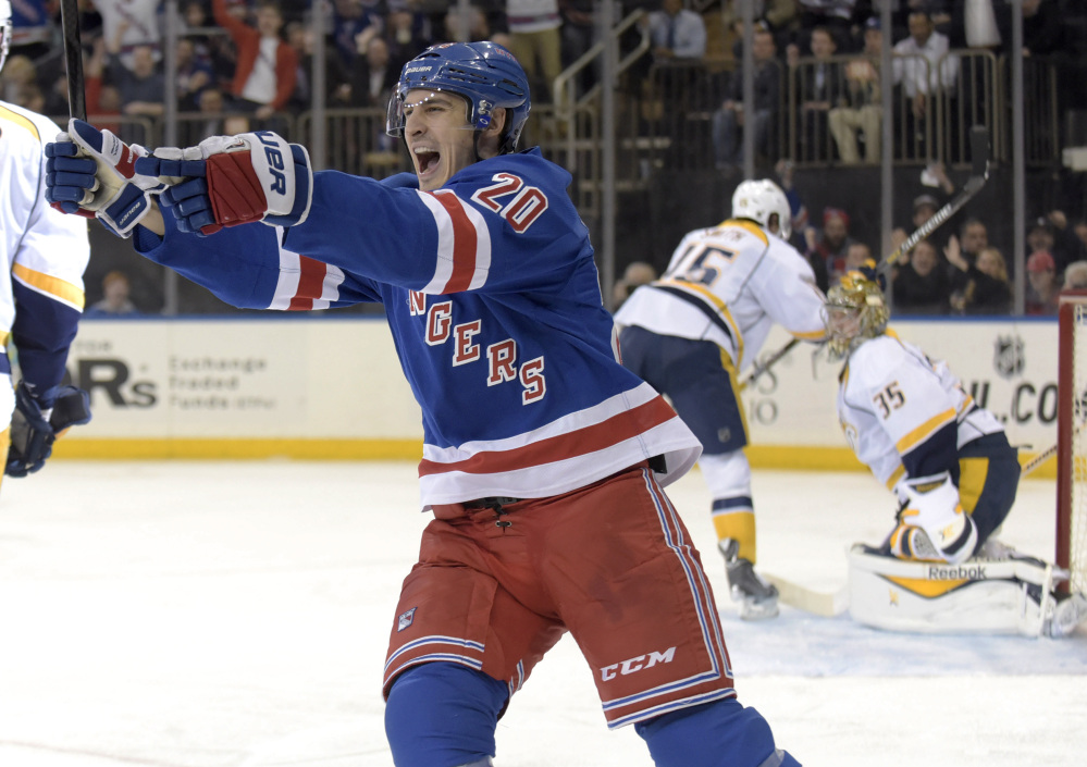 New York’s Chris Kreider celebrates his goal during the second period of the Rangers’ 4-1 win over the NHL-leading Nashville Predators on Monday in New York.