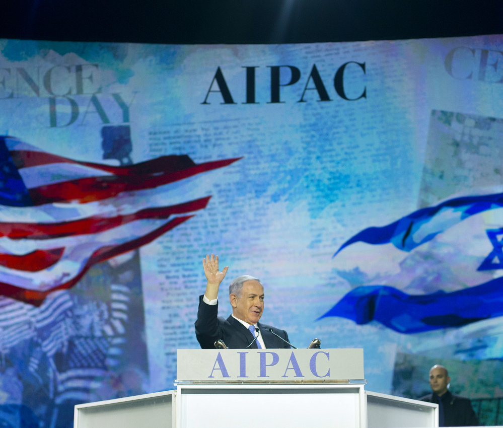 Israeli Prime Minister Benjamin Netanyahu waves to members of the audience before speaking at the American Israel Public Affairs Committee Policy Conference in Washington on Monday. Netanyahu will speak before Congress on Tuesday.