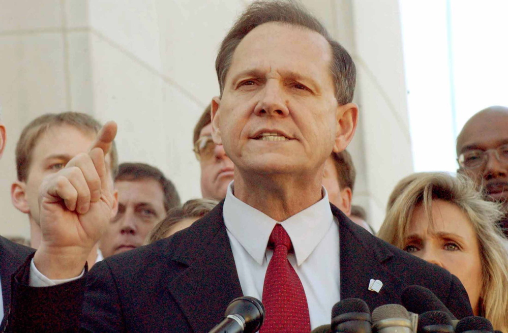 Alabama Chief Justice Roy Moore answers questions from the media.