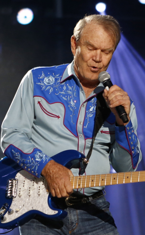 Glen Campbell, seen in healthier days, may be living out his life as the center of a family dispute.