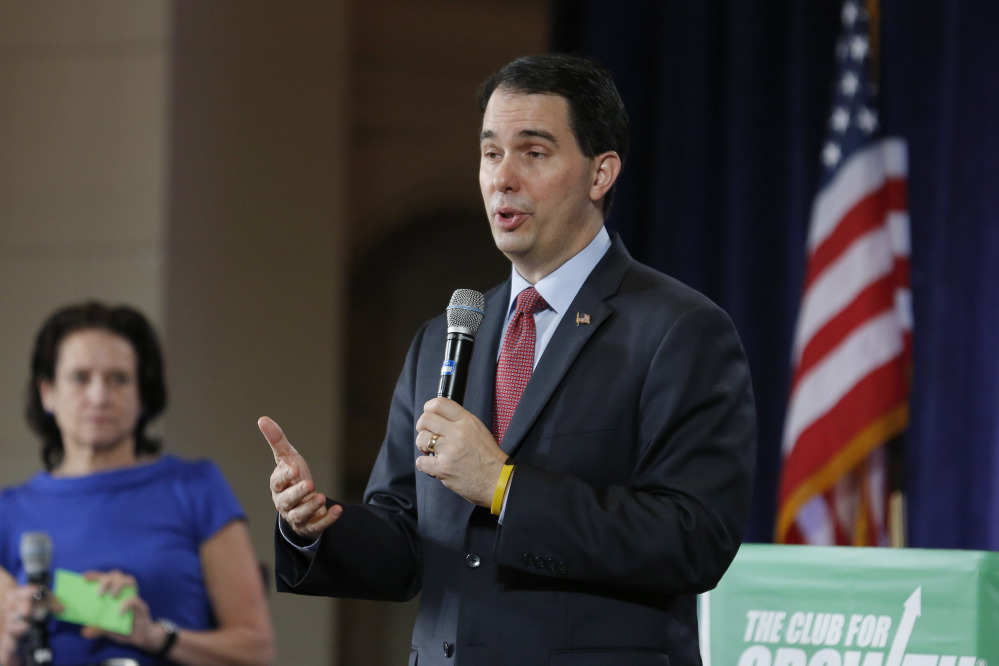 Gov. Scott Walker of Wisconsin also kept a personal email account as Milwaukee County executive, and two of his associates were convicted of campaigning on public time.