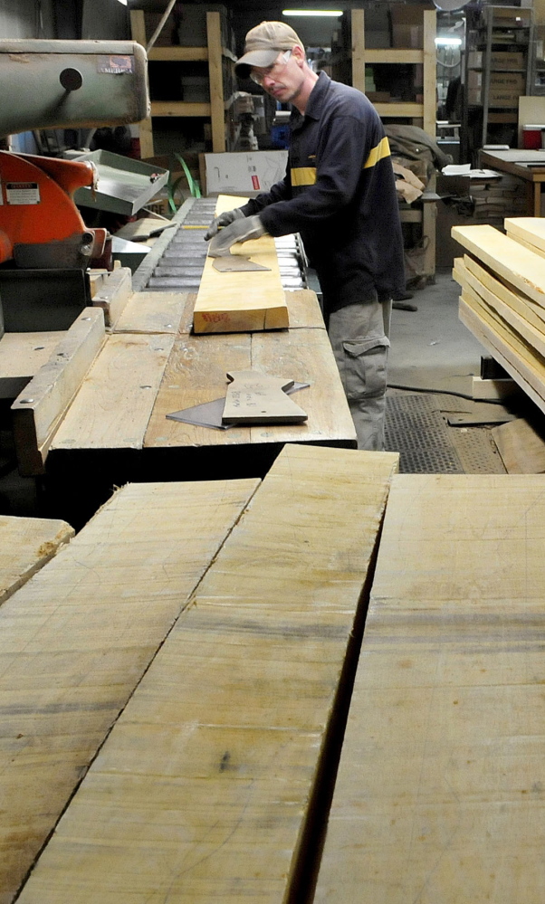 Mike Pelletier works at the thriving Cousineau Wood Products in North Anson.