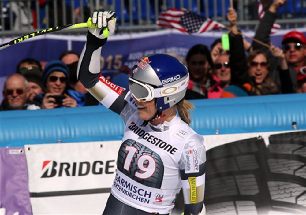 Lindsey Vonn celebrates in the finish area after completing the women’s World Cup super-G, in Garmisch Partenkirchen, Germany, on Sunday. Vonn won the event.