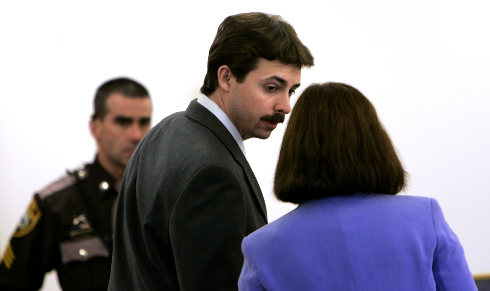 Billy Flynn, center, talks to his defense lawyer Cathy Green, right, at Rockingham Superior Court in Brentwood, N.H., on Jan. 25, 2008. Flynn is serving a 28 years-to-life prison term for killing his lover Pamela Smart’s husband when Flynn was a teen.