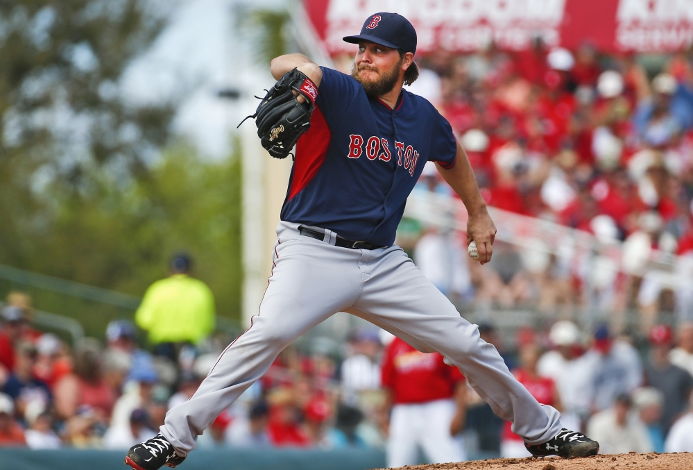 Wade Miley delivers a pitch during his second start of spring training Monday in Jupiter, Fla. Miley pitched three scoreless innings and the Red Sox beat the Cardinals 3-0.