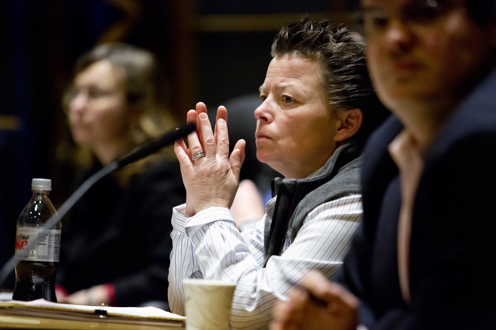 Tammy Manson, director of Portland's inspections division, waits to speak at a meeting of the Public Safety, Health and Human Services Committee as members discuss whether the city should overhaul its fire safety program
Gabe Souza/Staff Photographer