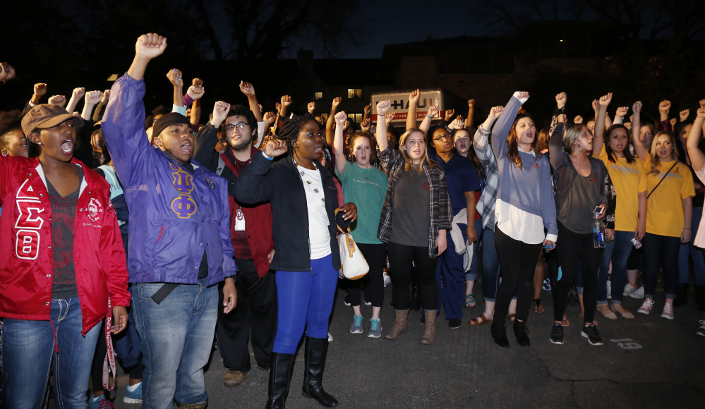 University of Oklahoma students rally outside the now closed University of Oklahoma’s Sigma Alpha Epsilon fraternity house during a rally in Norman, Okla., Tuesday.
