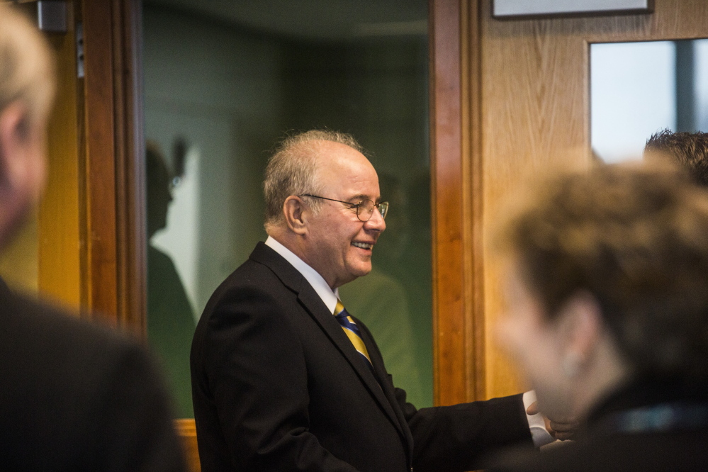 PORTLAND, ME - MARCH 11: New USM President Harvey Kesselman greets attendees of a press conference held at the Glickman library at USM in Portland, ME on Wednesday, March 11, 2015. (Photo by Whitney Hayward/Staff Photographer)
