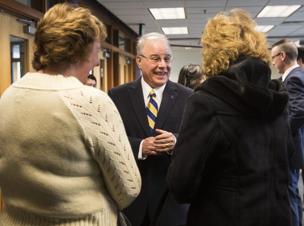 Newly appointed USM President Harvey Kesselman greets people Wednesday at the Portland campus, where he was praised for his extensive resume. “He has been on both sides of the union, on both sides of shared governance,” said Faculty Senate President Jerry Lasala.