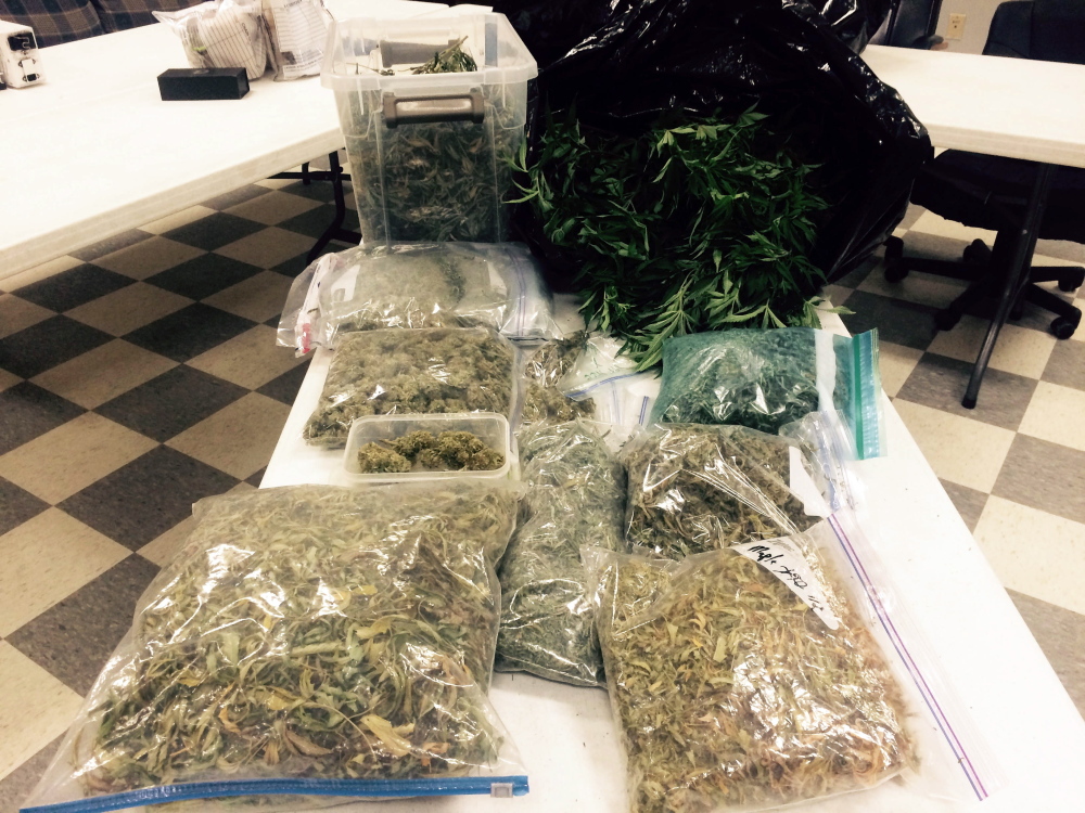 Fryeburg police seized more than four pounds of marijuana in an arrest of a local man Tuesday.