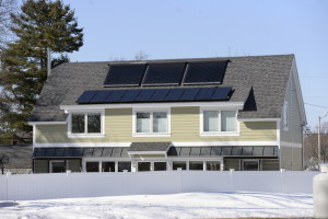 A home with solar panels on Victor Road in Portland. A recently released study by the state shows investment in solar power offers long-term benefits for consumers and the environment. The report will form the basis for debate in Augusta around the cost-effectiveness of subsidies. Shawn Patrick Ouellette/Staff Photographer
