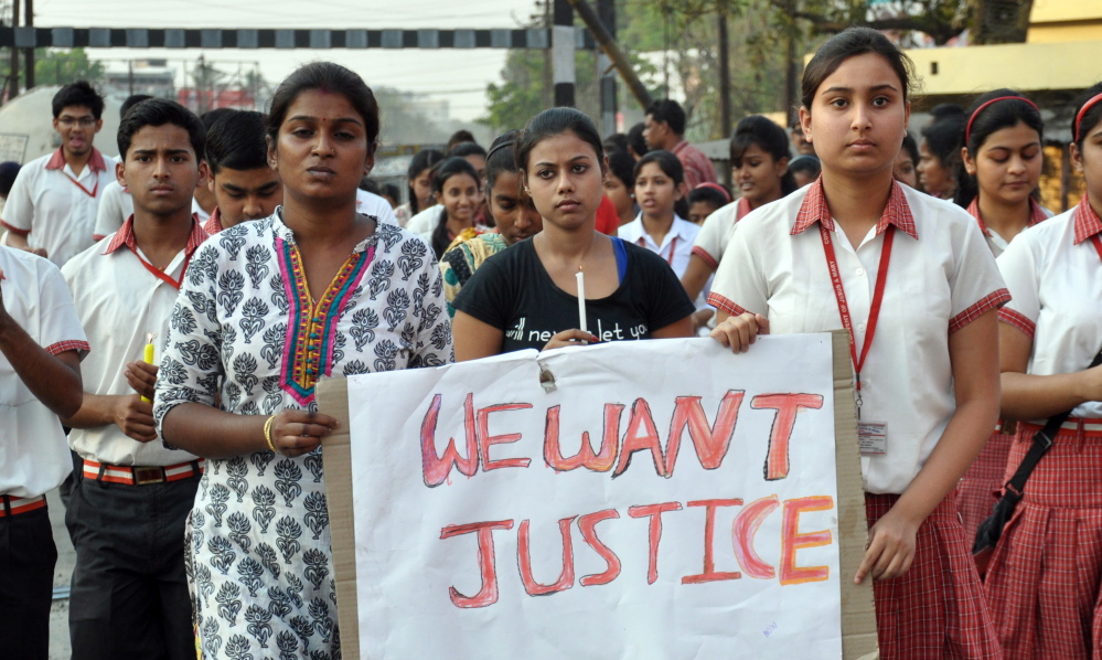 Students of Convent of Jesus and Mary School protest against the gang rape of a nun in her 70s by bandits when she tried to prevent them from robbing a Christian school.