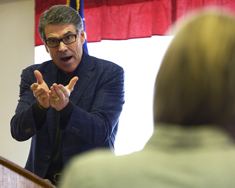 Former Texas Gov. Rick Perry speaks at a town hall meeting at VFW Post 816 in Littleton, N.H., on Friday.