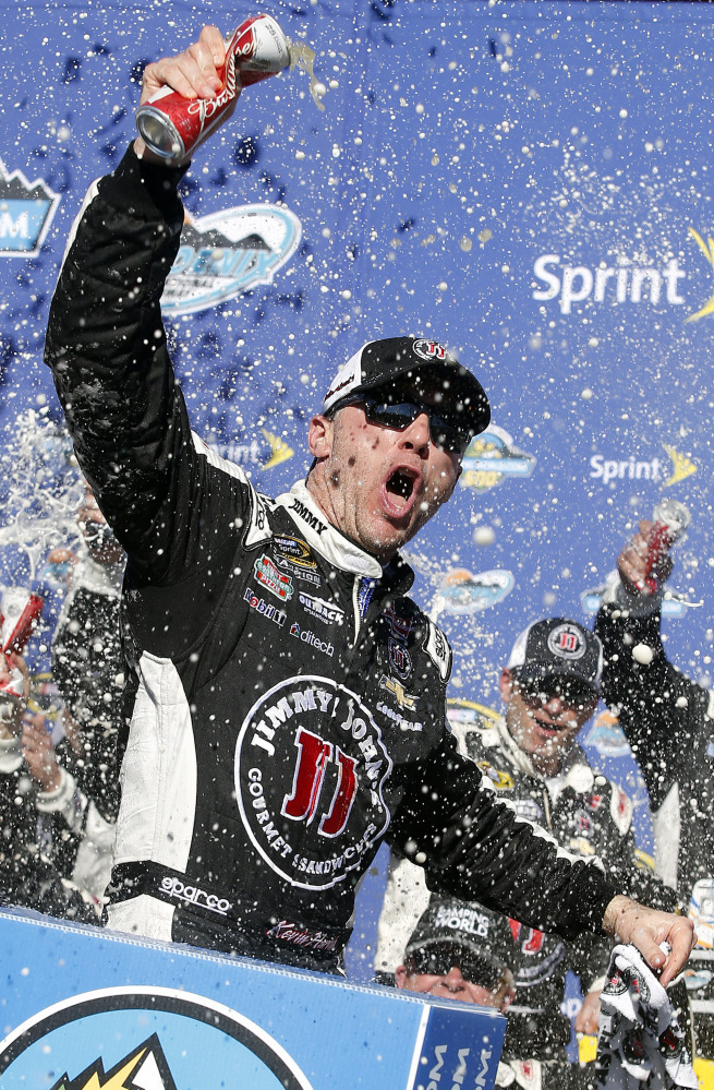 Kevin Harvick celebrates after an easy win at Phoenix International Raceway, where he has won five of the last six races.